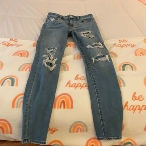 New American Eagle patched hole jeans